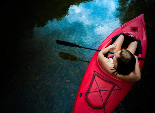 overhead girl sitting in kayak on Shenandoah River