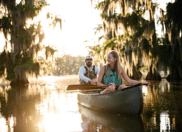 Couple Paddling at Lake Martin in Breaux Bridge, Louisiana