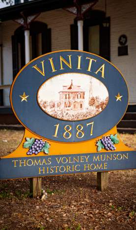 Sign indicating the property of the "Vinita" House built in 1887 and Thomas Volney Munson's Historic Home
