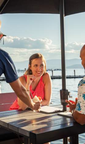 Couple Served Cocktails at Lakeside Dining Patio Eldorado Resort