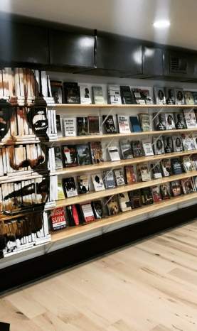 A bookshelf inside Baldwin & Co.