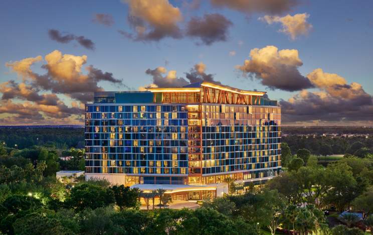 Exterior of Walt Disney Swan Reserve at dusk