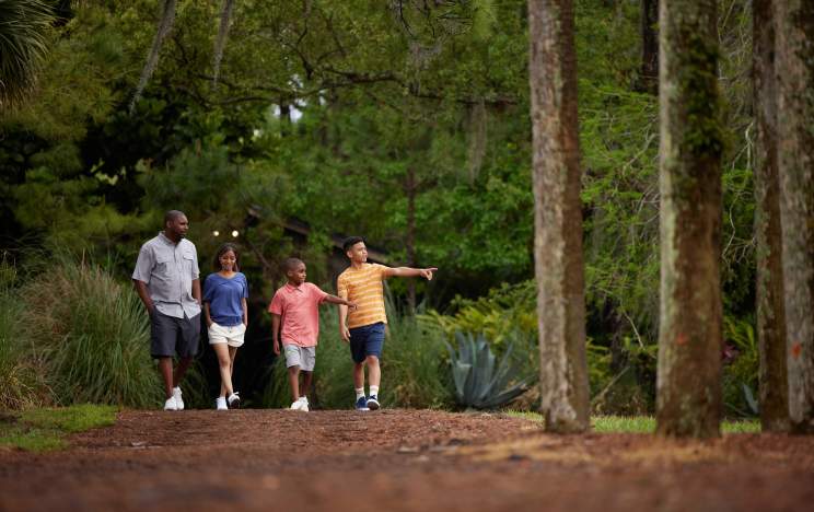 A family enjoying nature at Hyatt Regency Grand Cypress Resort