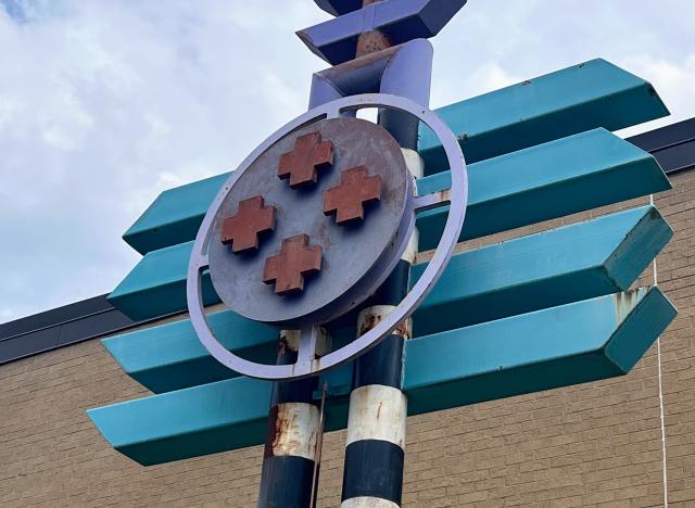Medicine Wheel Totem Pole by Doug Coffin