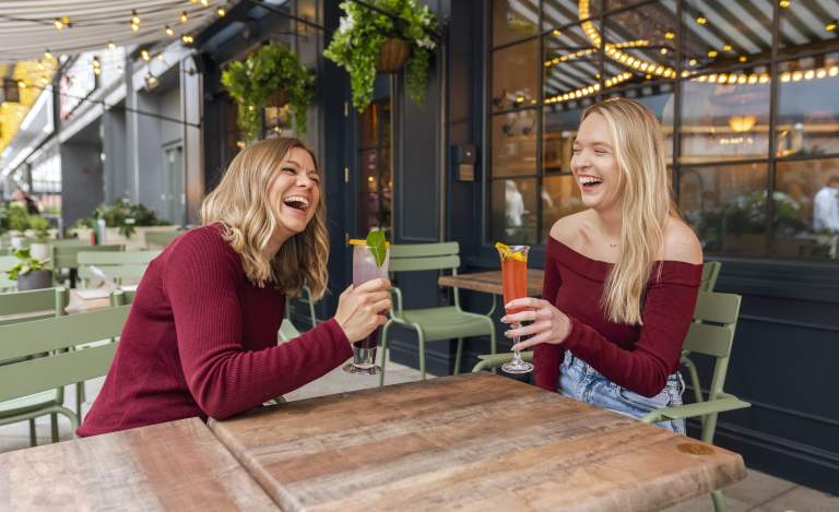 Ladies enjoying cocktails at Flight Club Cheltenham