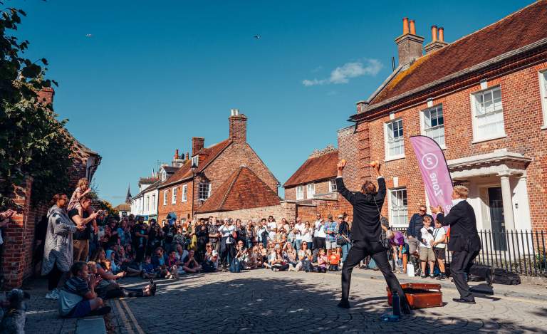 2 Street performers entertaining a crowd