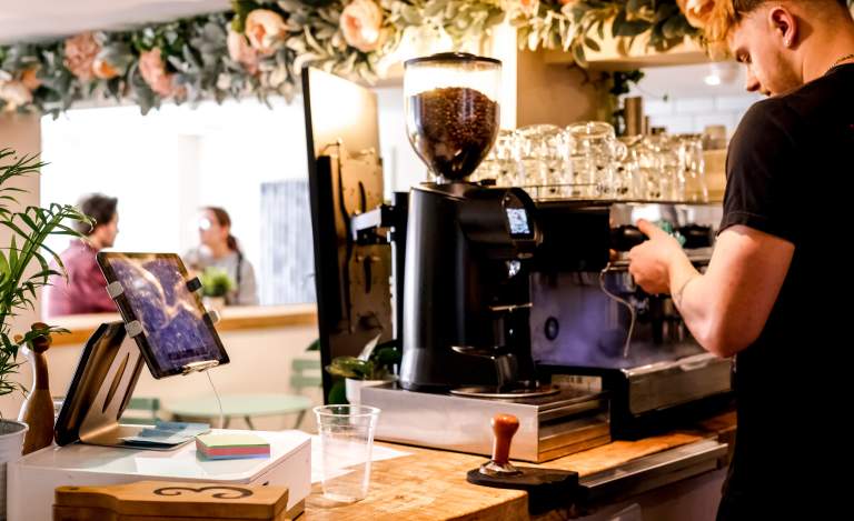 Barista making coffee