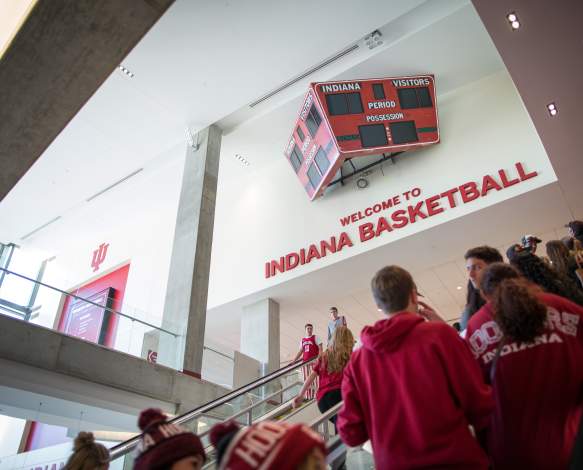 People riding the escalator to the second floor of Assembly Hall