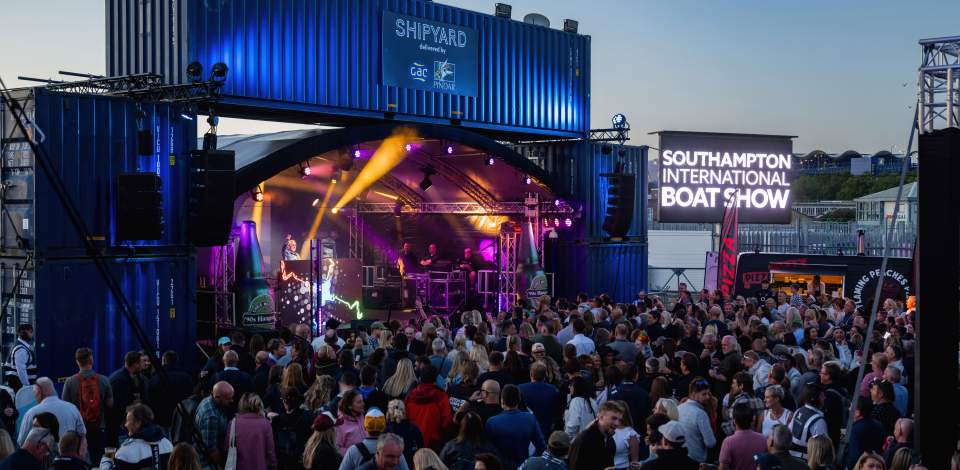 Performance on stage in front of crowd of people at the Southampton International Boat Show