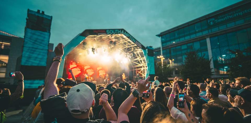 Crowd cheering at Southampton Summer Sessions in Guildhall Square