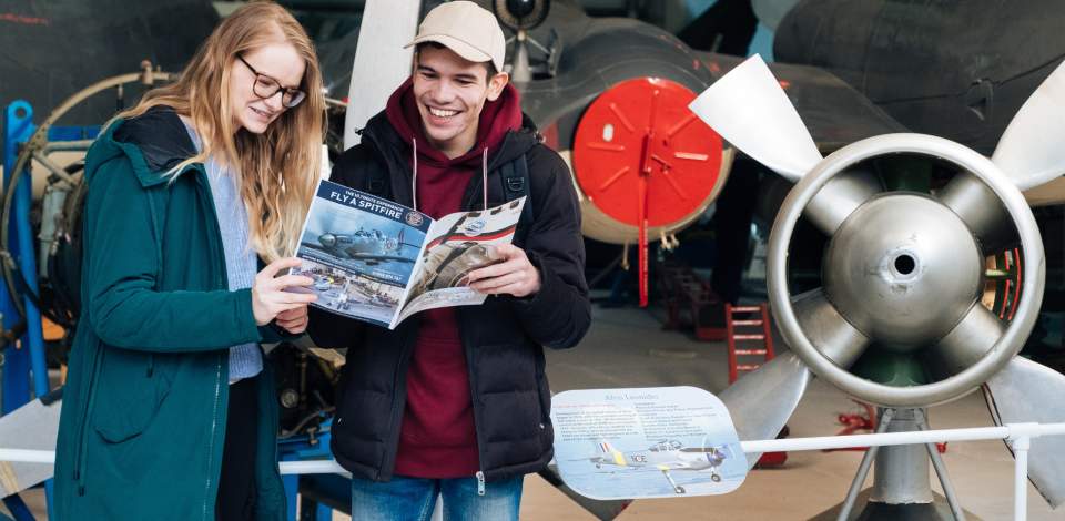 Two visitors enjoying Solent Sky Museum in Southampton