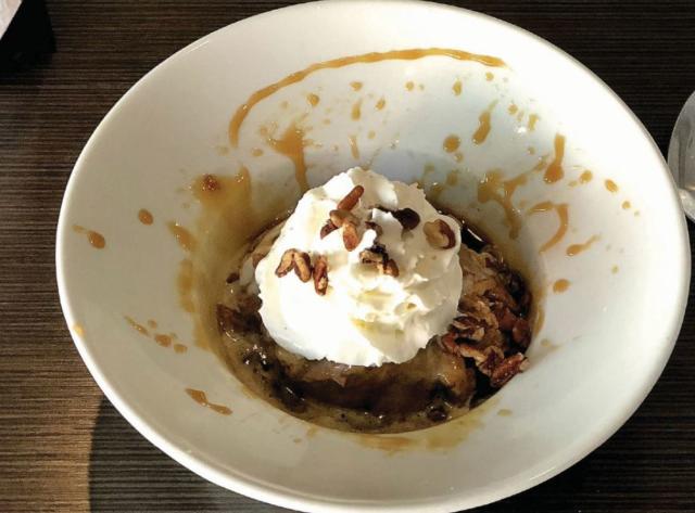 Bread Pudding Special. Bread Pudding Topped with cream and caramel sauce