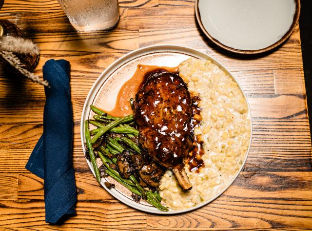 Butcher Cut Pork Chop with glaze, cheese corn and green beans