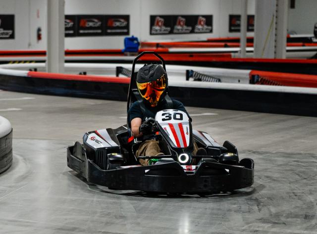 Person Driving Go Kart