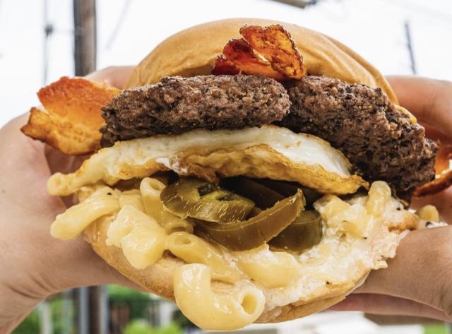 Grim Reaper: Mac & Cheese, Jalapenos, Bacon, Cheddar Cheese, Sunny Side up Egg, Cayenne Butter..