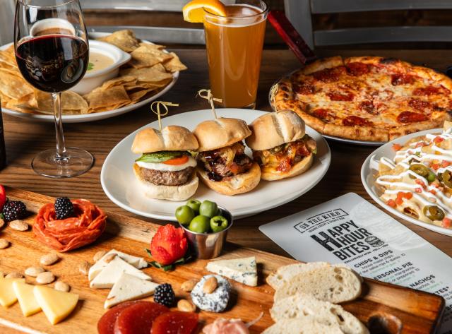 Sliders surrounded by Appetizers, Wine and Beer