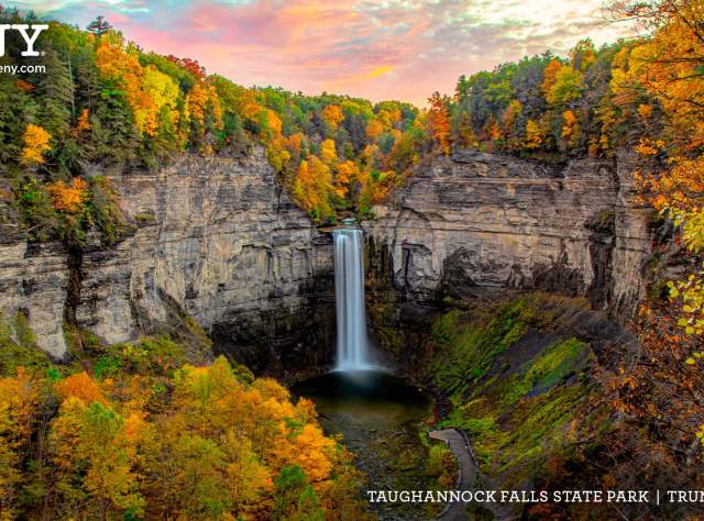 Cascading waterfall surrounded by beautiful fall foliage at Taughannock Falls State Park