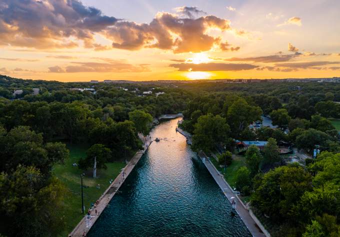 Aerial view of Barton Springs Pool at Sunset in Austin Texas