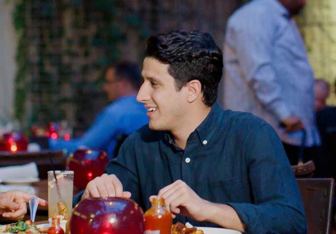 Couple dining together on patio