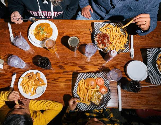 Overview of a table full of food from the Firehouse Brewing Company Menu in Rapid City, South Dakota