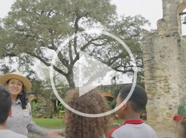 Tour guide with class at Missions