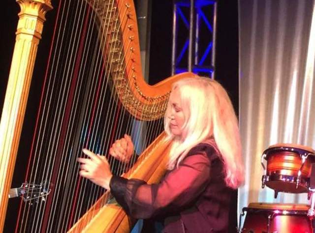 Picture of Jan Aldridge Clark playing the harp