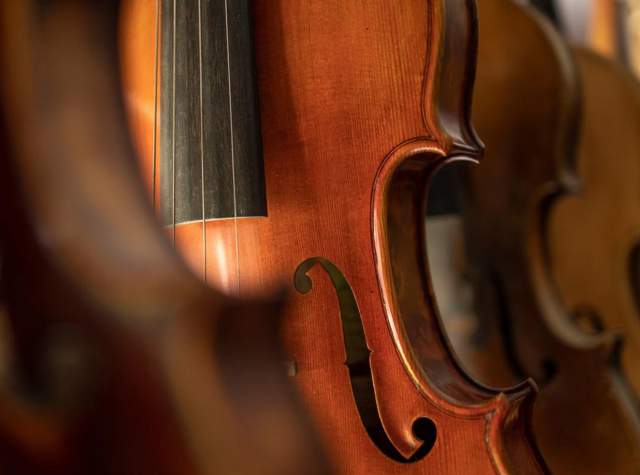 A violin in promotion for Brass and Brahms