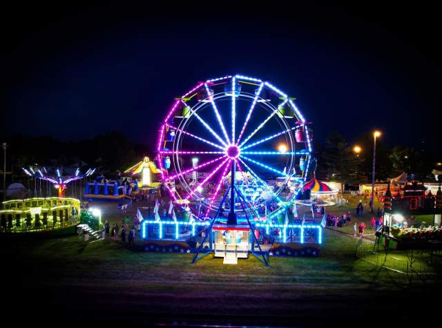 Festival rides and Ferris wheel