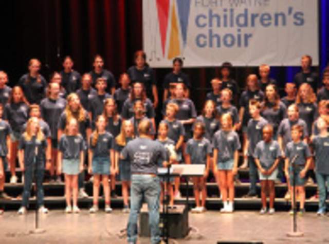 The Fort Wayne Children's Choir on stage performing at Foellinger Theatre