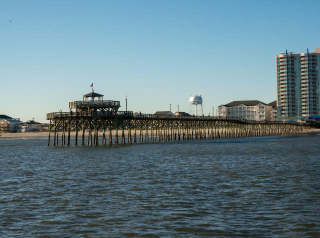 The Cherry Grove pier from the water looking back at the shore and Prince Resort