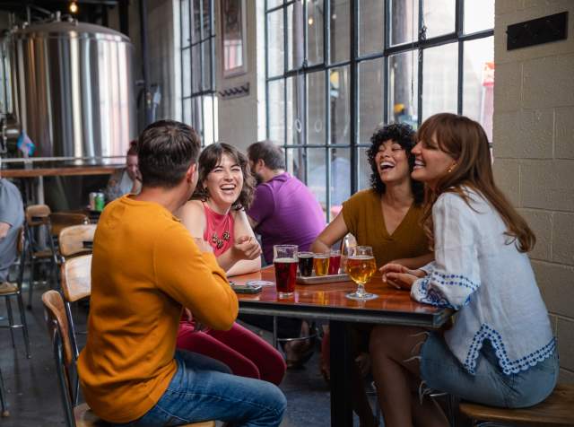 Image of a group of people at Fisher Brewing in SLC