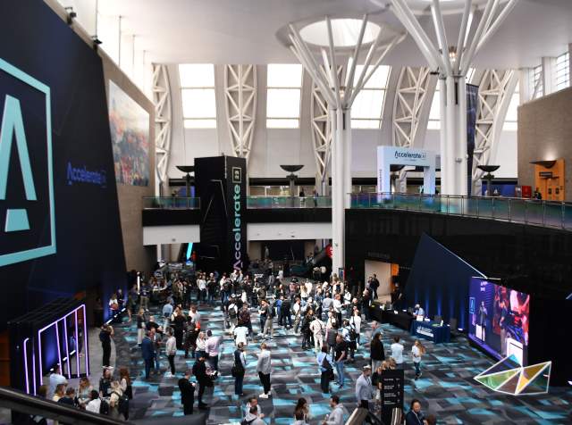 Photo of a large open area at the Salt Palace Convention Center from the top of the grand staircase looking toward the exhibit halls