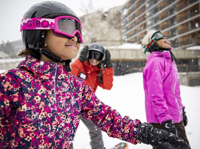 Kids taking snowboarding lessons at Snowbird's Mountain School