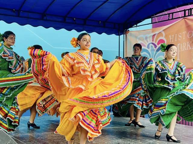 Folklorico dancers in Day of the Dead makeup
