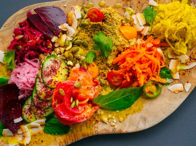 Overhead view of different foods on cutting board