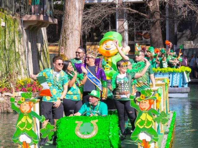 Parade float decorated in green decor for St. Patrick's Day
