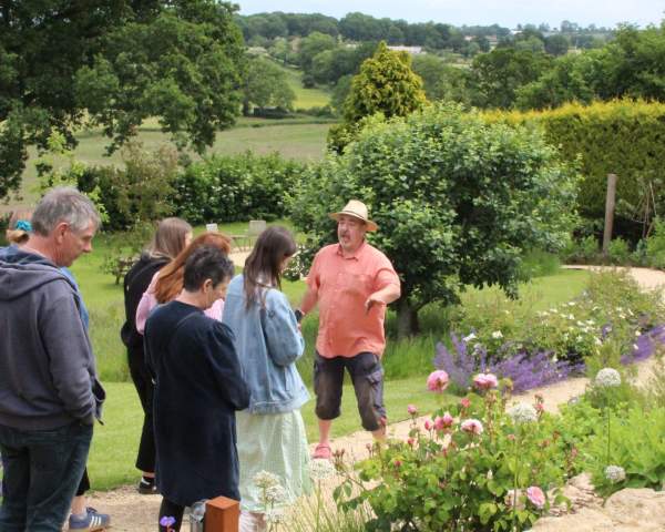 People inthe garden at The Pony Chew Valley in North Somerset near Bristol - credit Visit West
