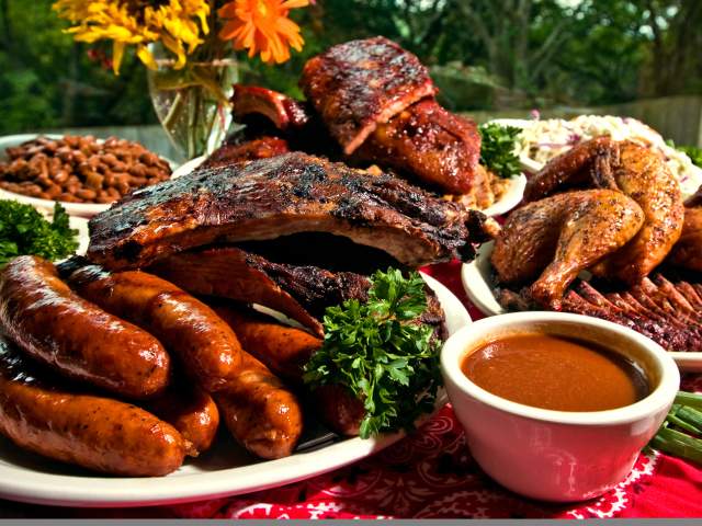 platters of BBQ at The County Line barbecue in austin texas