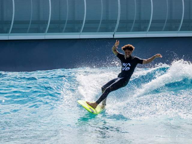 Person surfing at The Wave - credit The Wave