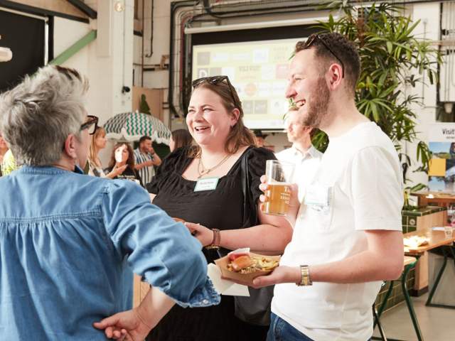 People talking at food and drink event - credit Charlotte Tolhurst