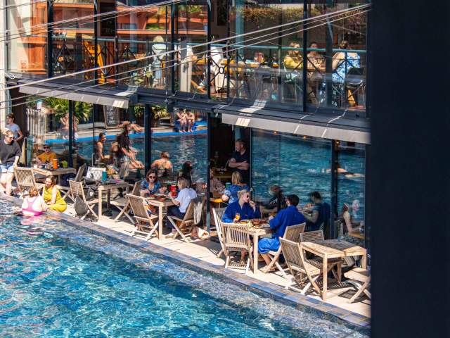 Bristol Lido people dining by pool