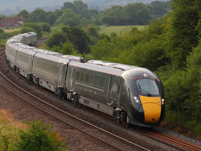 A GWR train travelling at speed on the train track - Credit Great Western Railway