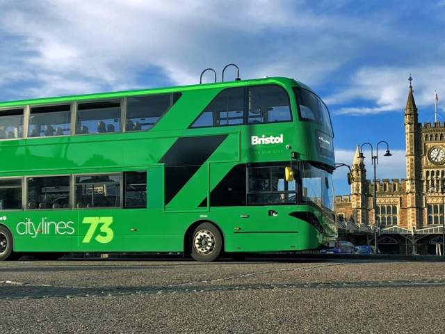 A green City Lines bus infront of Bristol Temple Meads - Credit First Bus