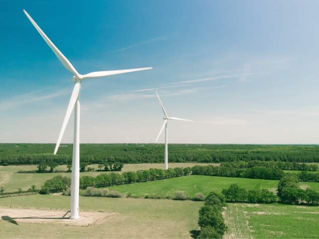 Wind turbines in fields