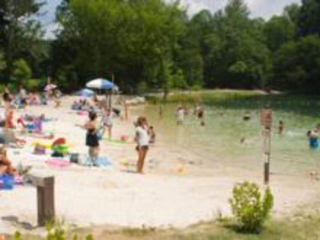 Swimmers at Fuller Lake beach in Pine Grove Furnace State Park.