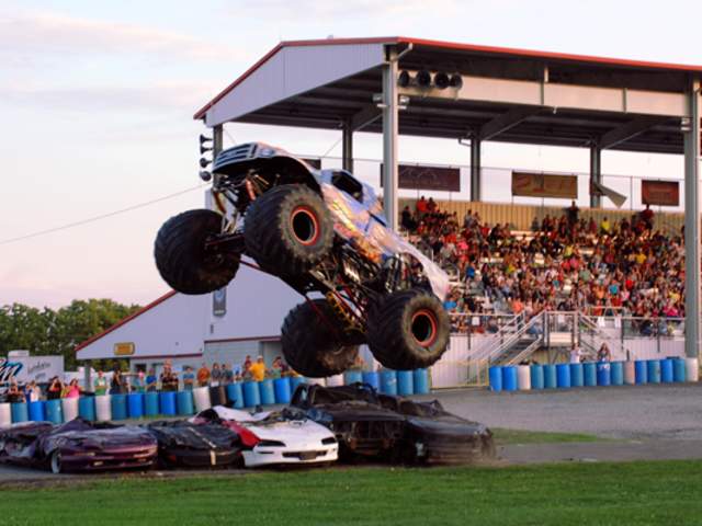 Monster truck jumping cars at the Carlisle Truck Show
