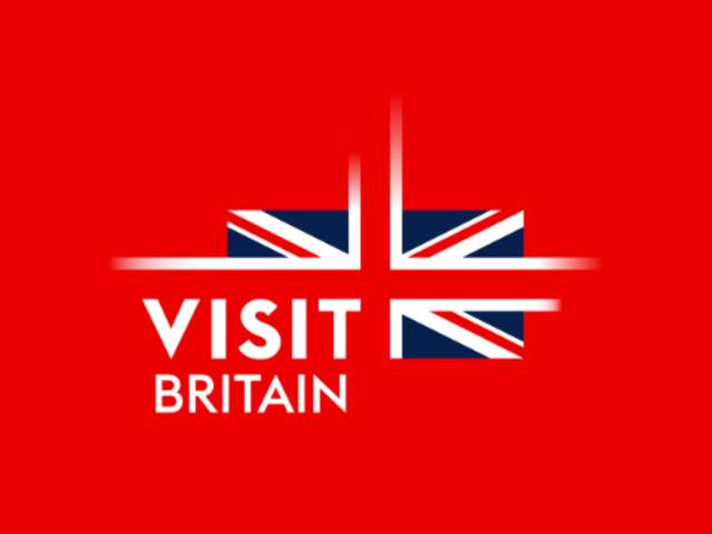 Visit Britain words with partial Union Jack on red background