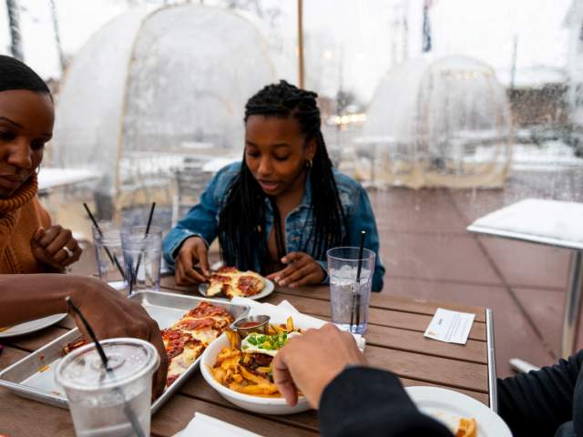 Family Dining in Bubble at Trubble Brewing in the Winter