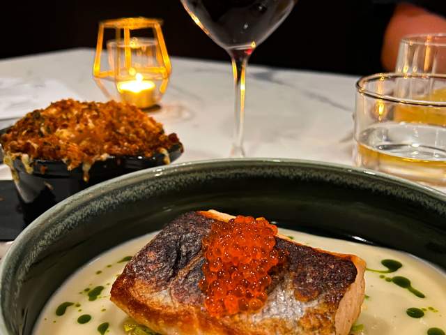 A dinner at Dana's in Fort Wayne. Salmon, baked mac and cheese, and red wine.