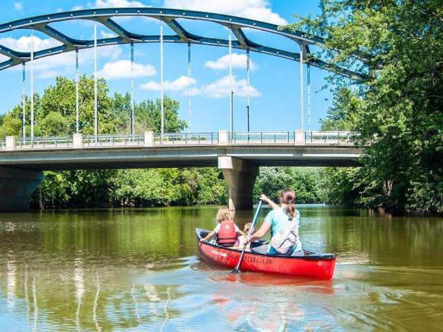 Family Canoe on the River